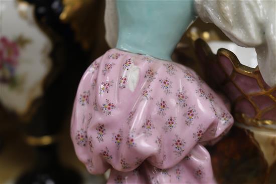 A pair of Paris porcelain figural bowls and a rolling pin